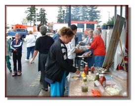 Everyone enjoying the BBQ food!